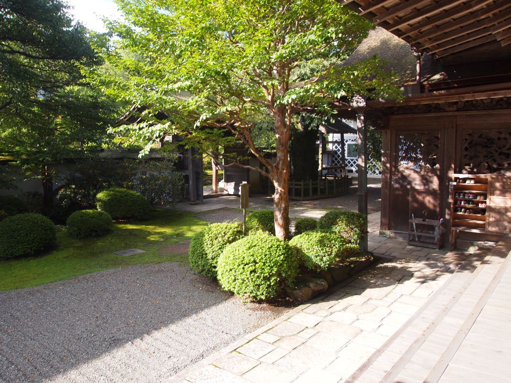 Exiting through the main entrance and into the courtyard