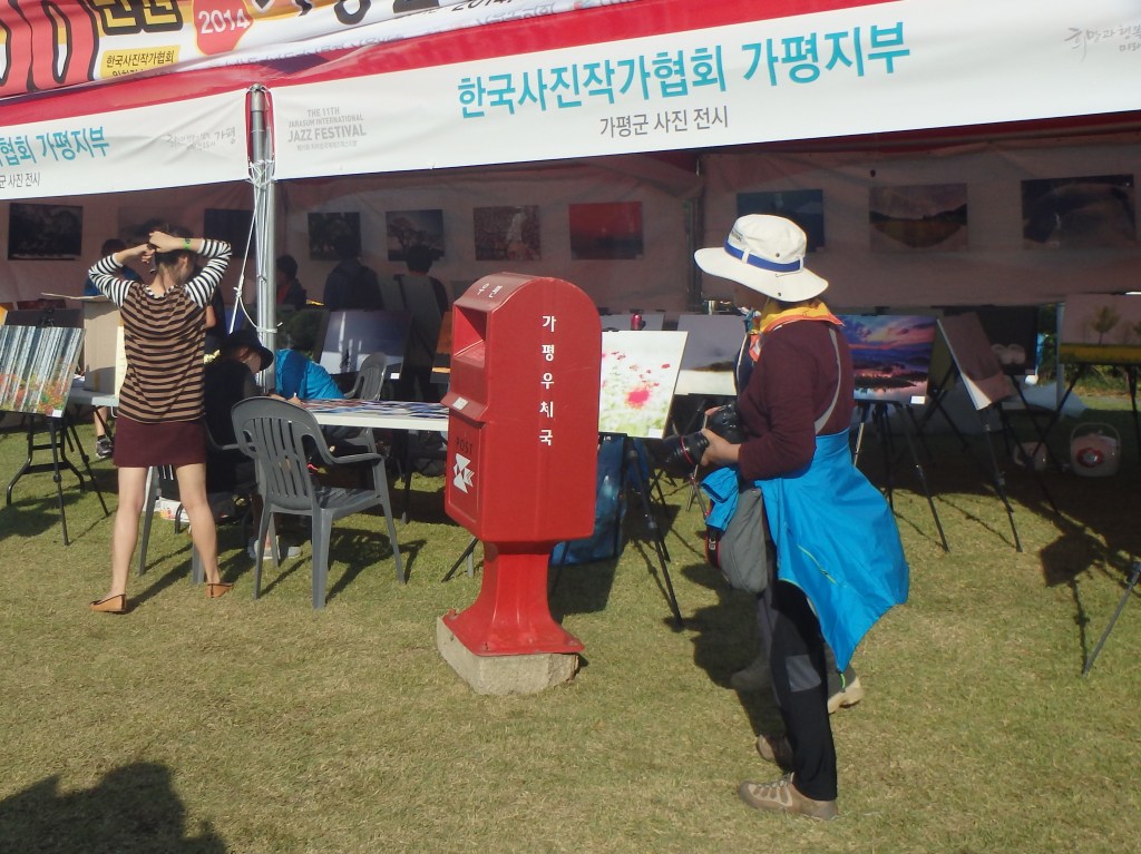 A photographer had set up an area where you could write on a postcard of one of his photos and then send it!