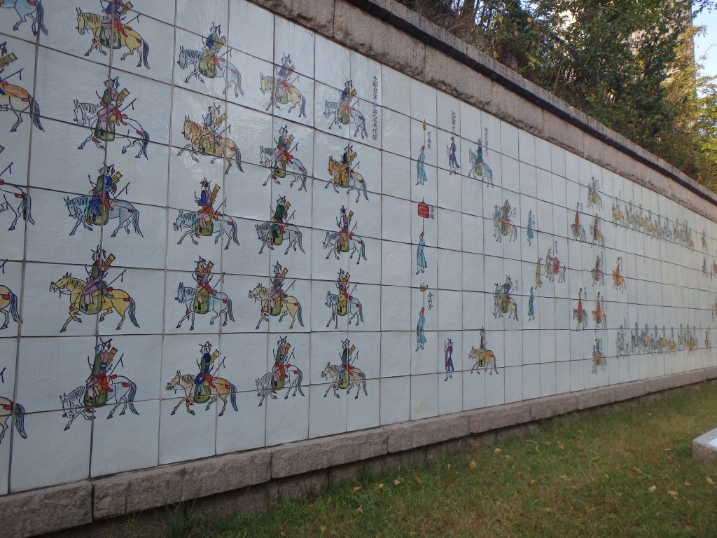 This is a mural of the procession of King Jeongjo and his mother, Queen Hyegyeonggung, going to visit his father's tomb 