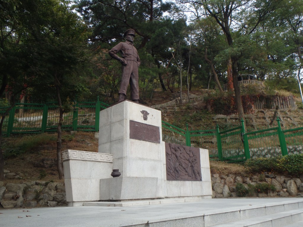This is a statue Choi Gyu Sik, a police chief who was mortally wounded during the firefight. He is credited with stopping the commandos before they got to The Blue House