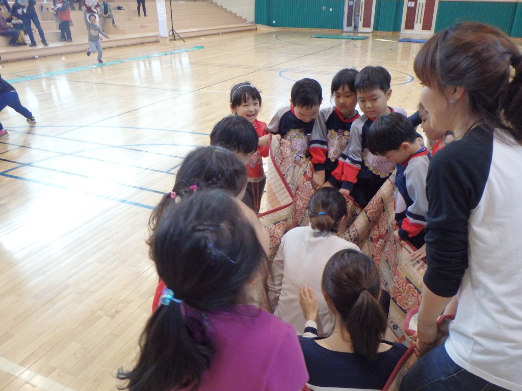 The kids had to carry two moms in a blanket!