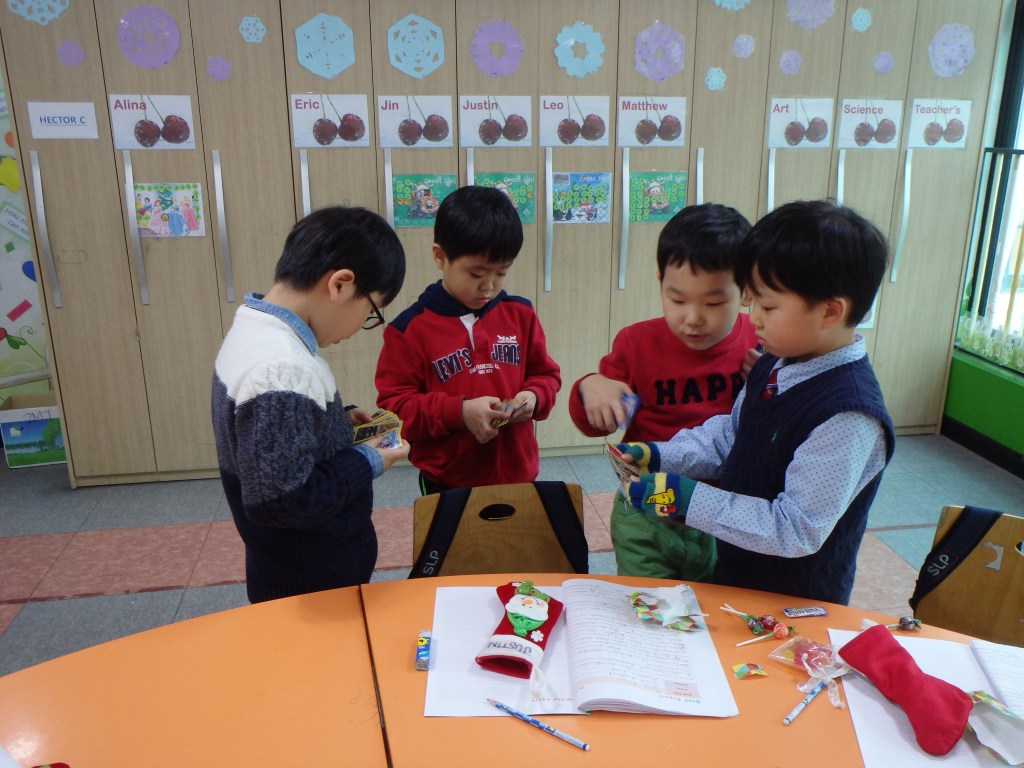 The boys comparing their Pokemon cards