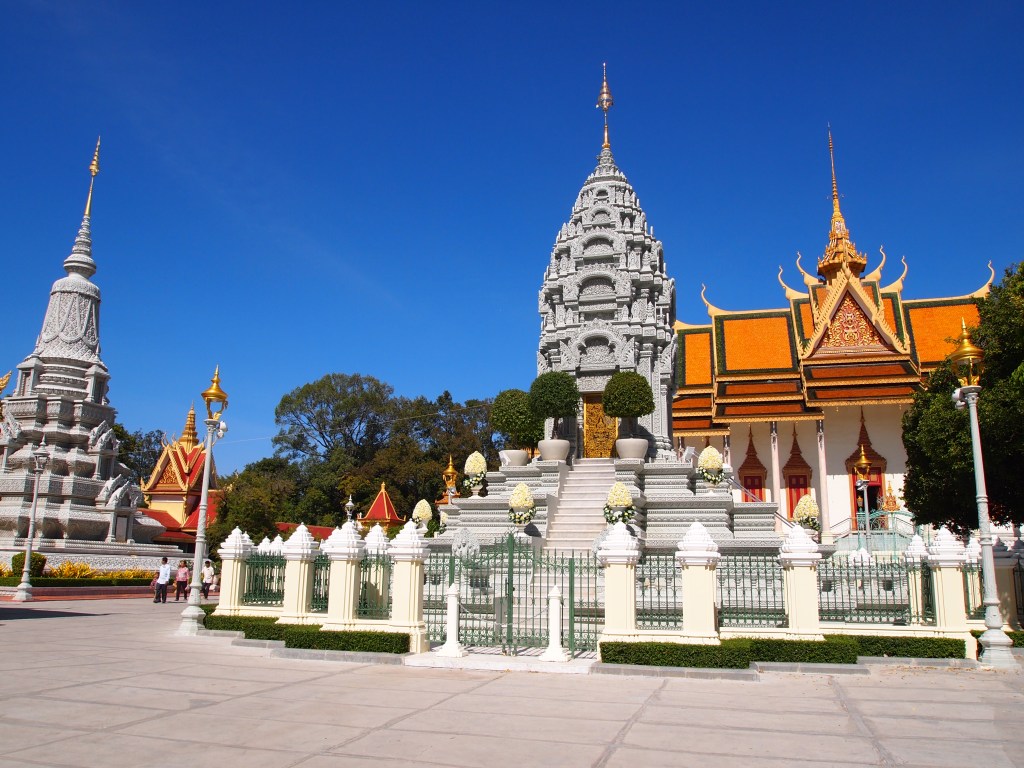 Silver Pagoda in the background with other stupas
