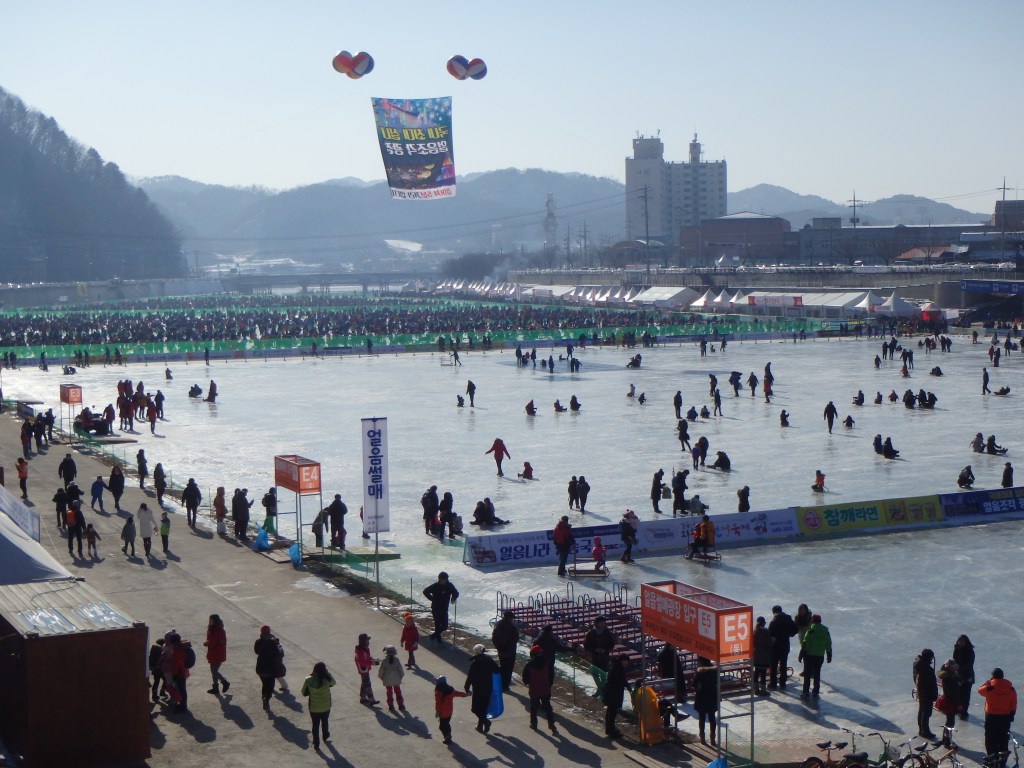 That mass of people in the distance is thousands of Koreans ice fishing 