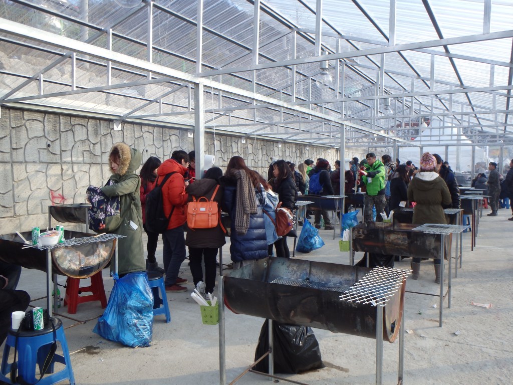 Once it was our turn, they carried our fish into a little area with several grills