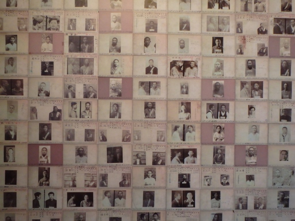 Photographs of the victims - there was an entire room filled with floor-to-ceiling photographs