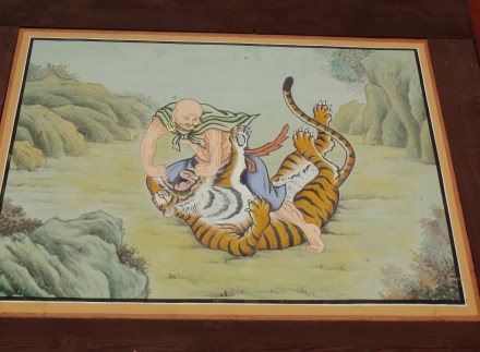 One of the paintings on the side panels