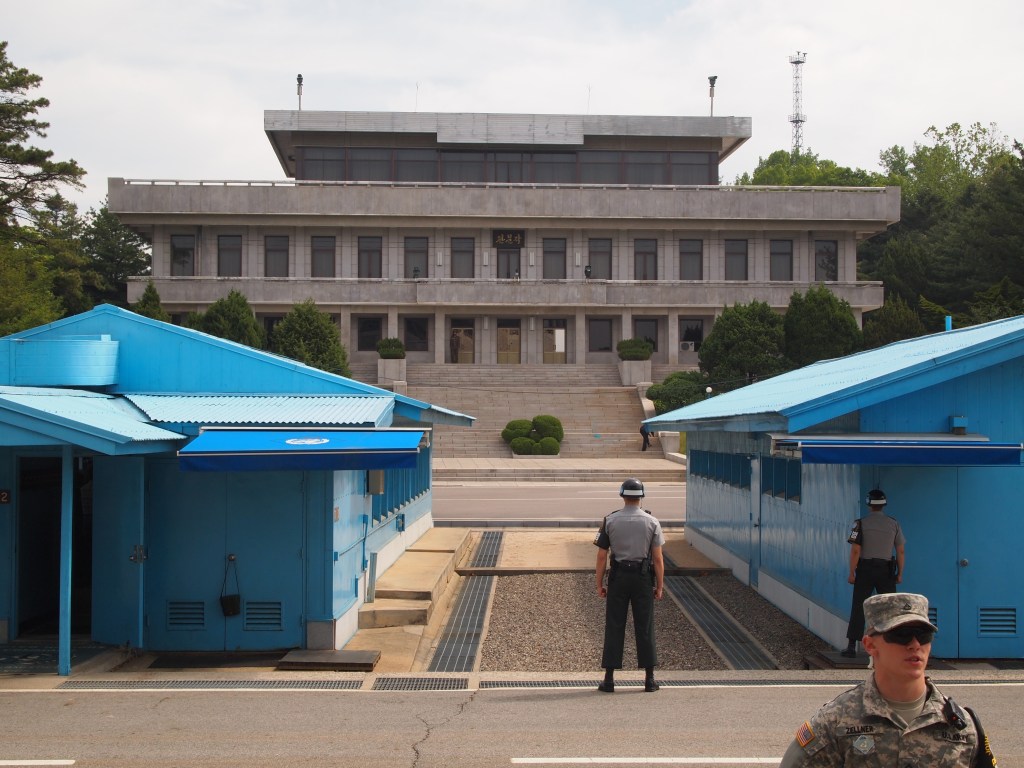 The blue buildings are ROK, the large building is DPRK