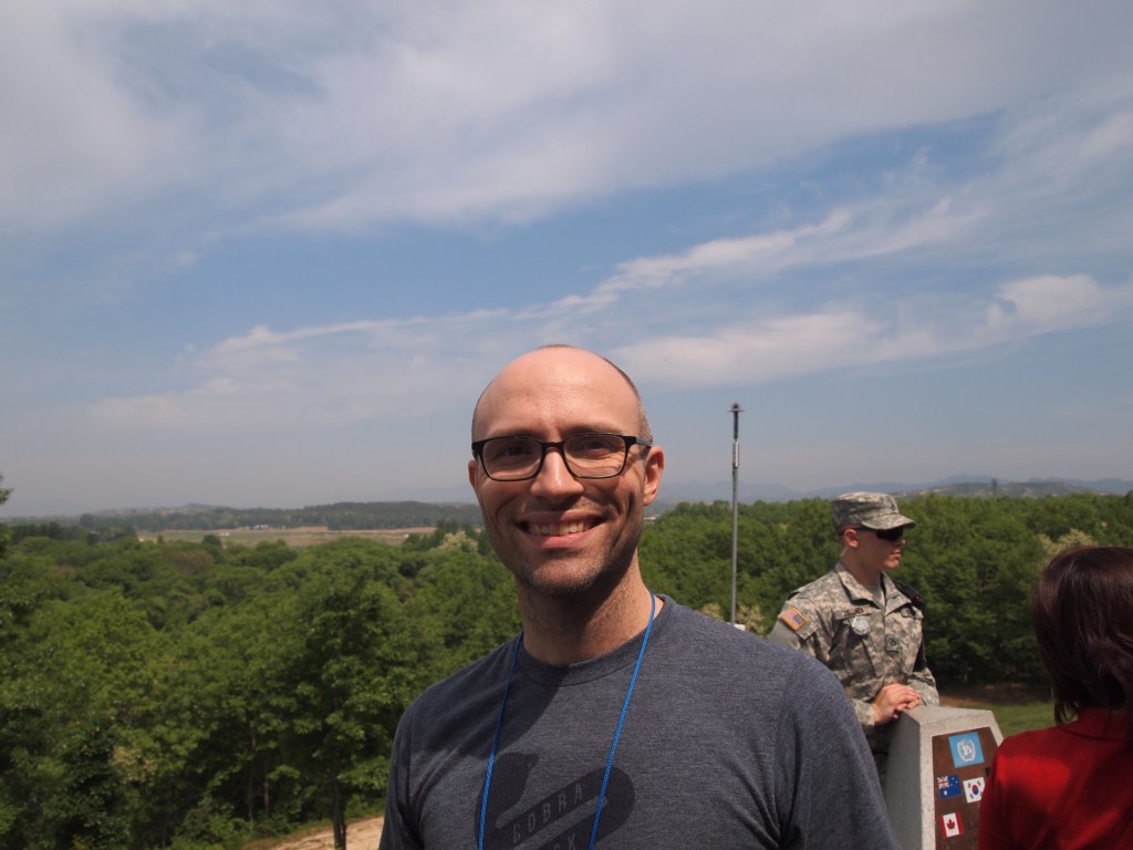 Zach with DPRK in the background