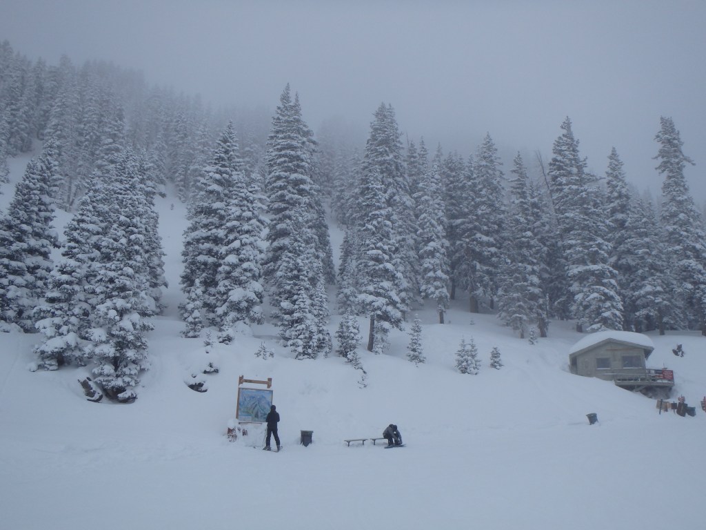 Zach reading the trail map