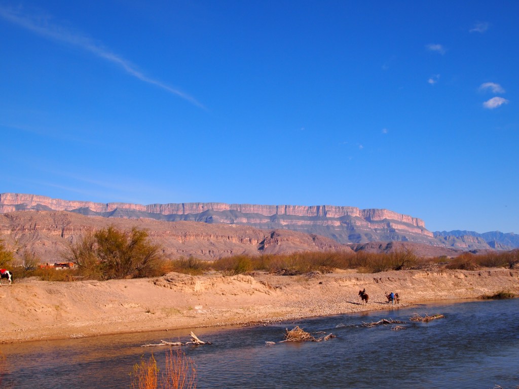 Our burros & the Sierra del Carmen shining in the distance