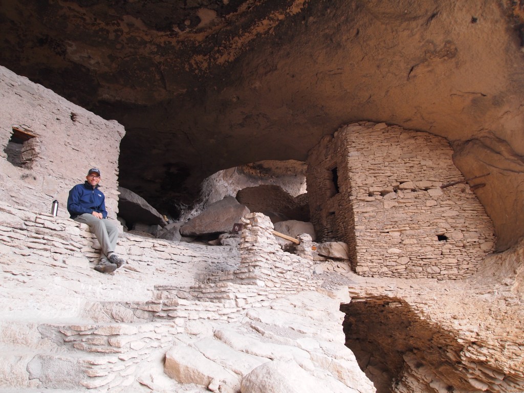 Zach perched at the top of cave four