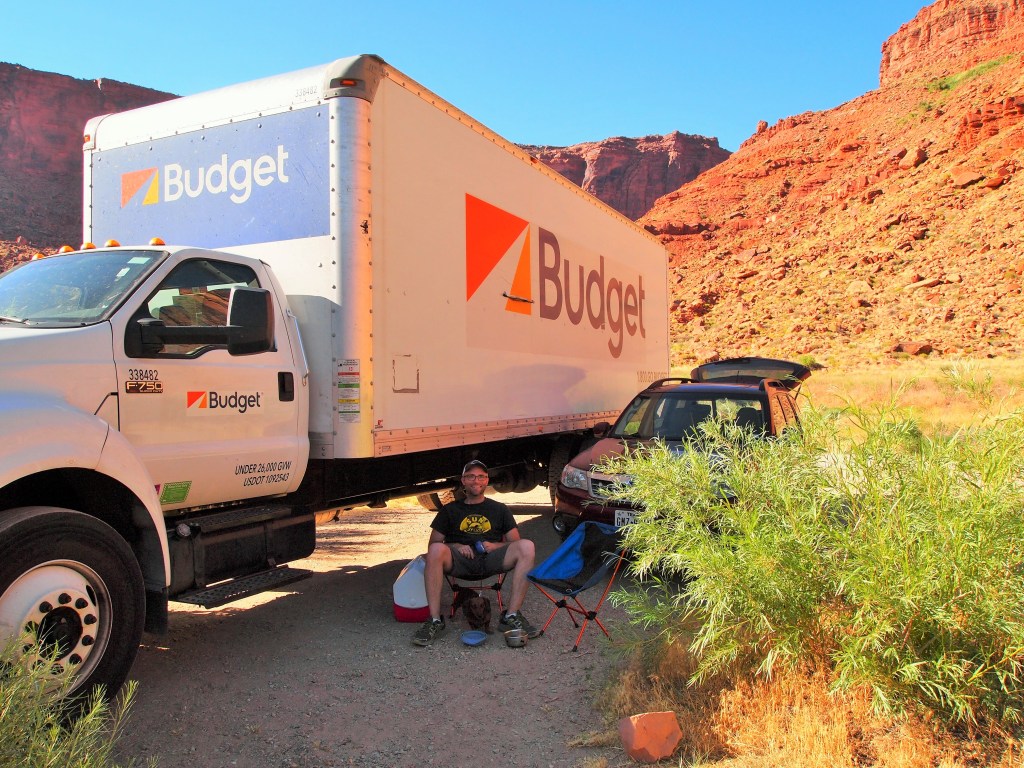 Enjoying the shade from the truck